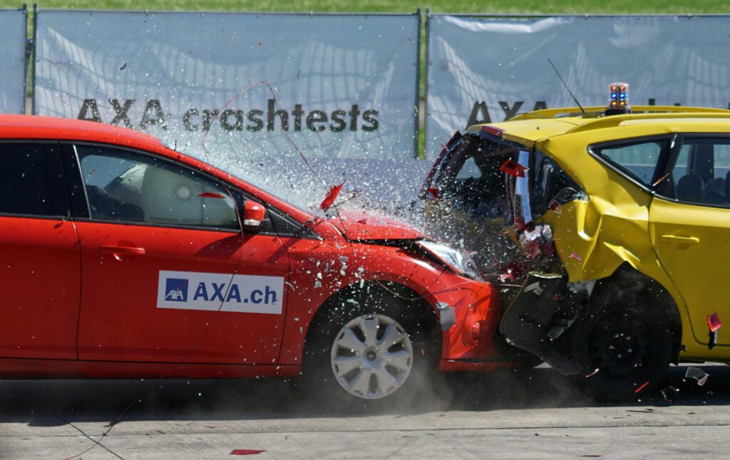 Front-end crash between two cars during a safety test